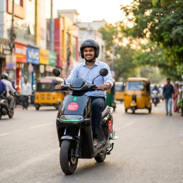 Rider using electric scooty for daily commute