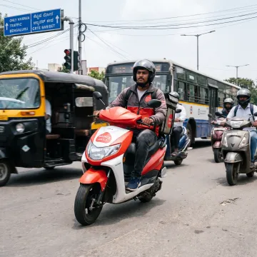 Delivery partner riding an electric scooter