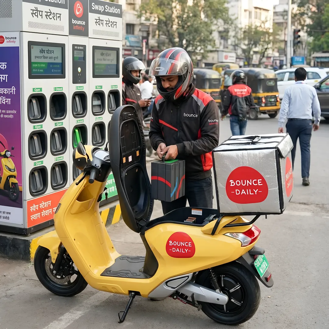 Electric rental scooter with swappable battery for delivery riders