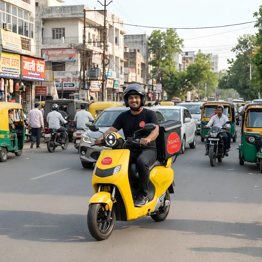 Rider picking up EV scooter after app booking
