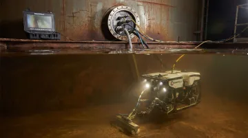 Bristola robotic ROV cleaning system operating inside industrial storage tank
