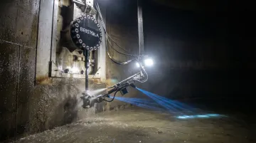 Bristola robotic tank cleaning system operating inside full anaerobic digester