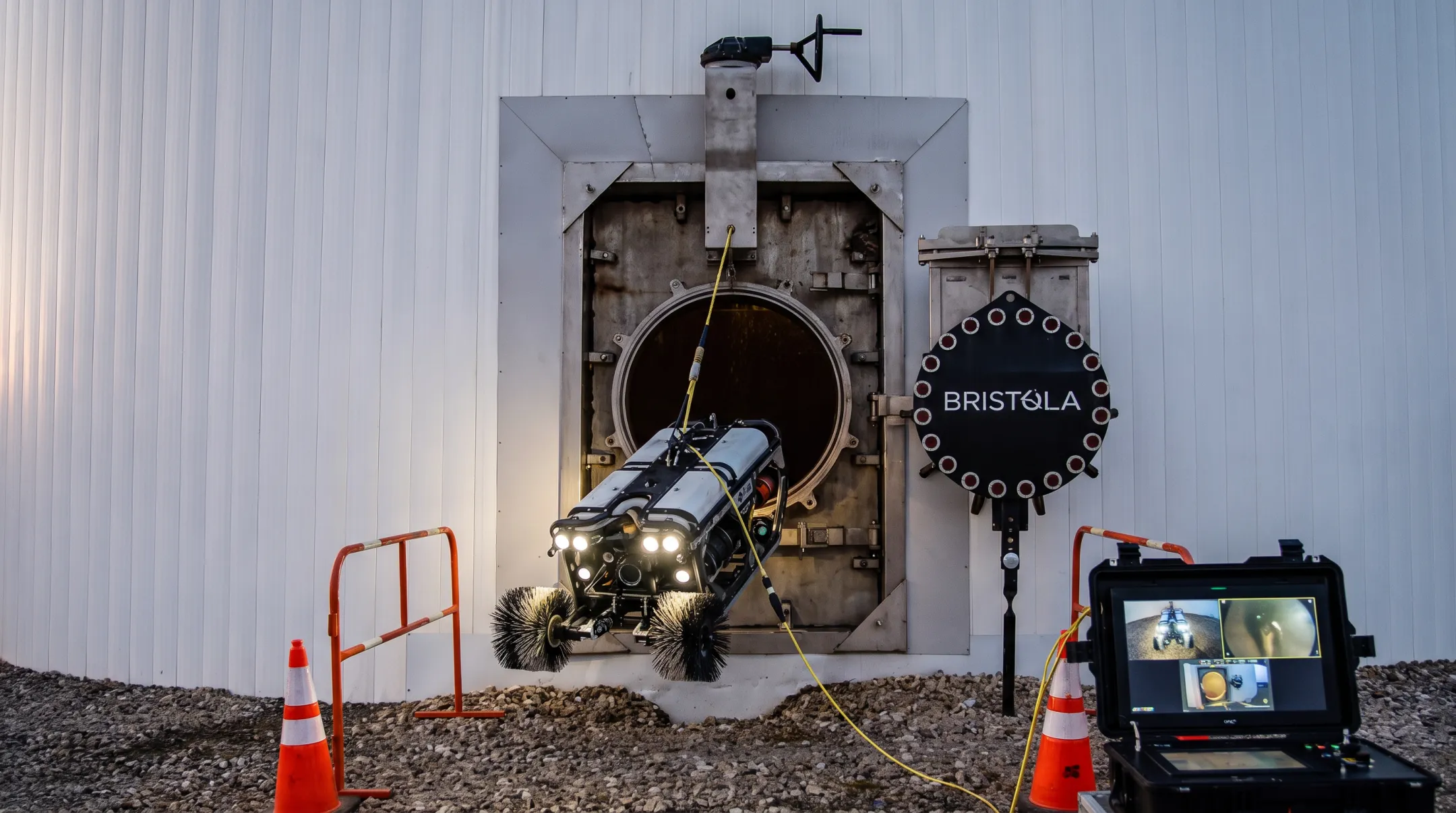 Submersible ROV robotic cleaning system inside operational digester tank