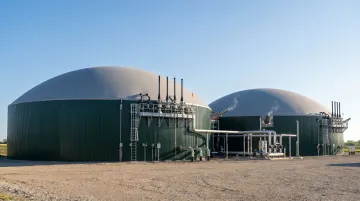 Large-scale anaerobic digester biogas facility with storage tanks in active industrial operation
