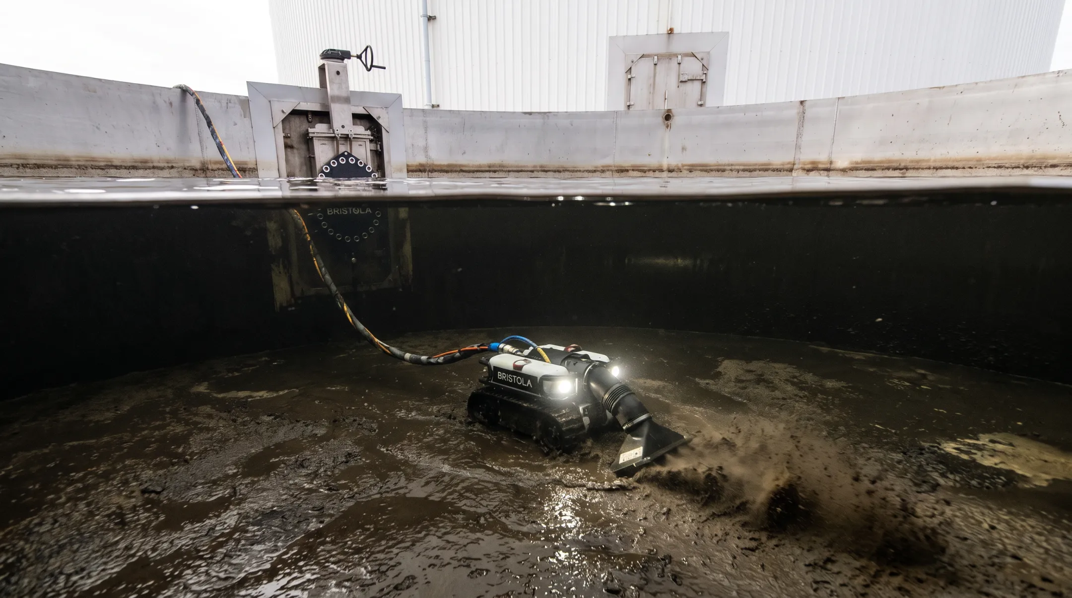 Submersible ROV robotic vacuum cleaning industrial lagoon sediment