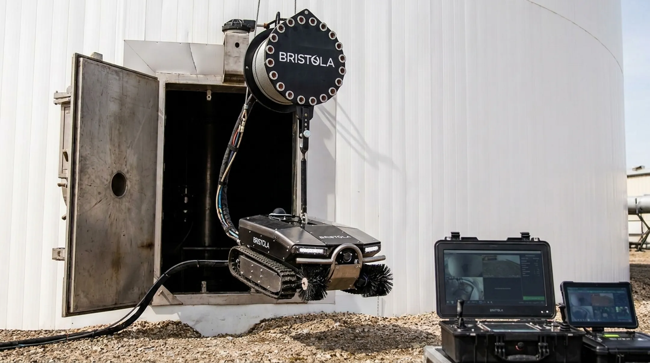 Submersible robotic cleaning system deploying into underground storage tank