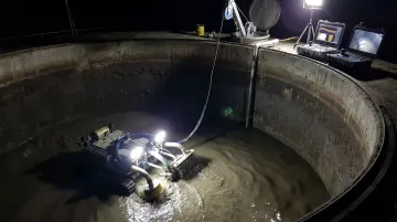 Bristola robotic ROV cleaning anaerobic digester tank during live facility operation
