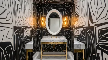 bold powder room design with statement vessel sink dramatic tile and decorative mirror