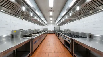 Narrow galley commercial kitchen layout with parallel counters and center aisle