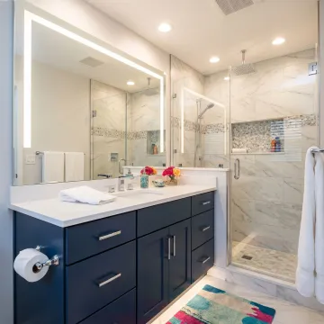 Modern bathroom renovation with custom vanity