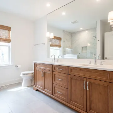 Modern bathroom renovation with custom vanity