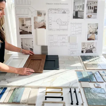 Designer selecting cabinetry and countertop finishes