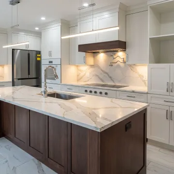 Installed commercial kitchen cabinetry and countertops in a business setting