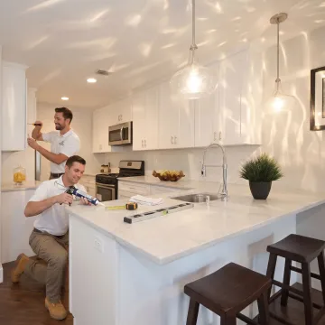 Modern renovated kitchen with custom cabinets and island
