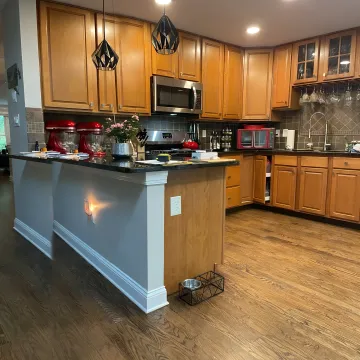 Designer reviewing kitchen renovation plans