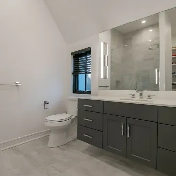 Designer reviewing bathroom remodel selections