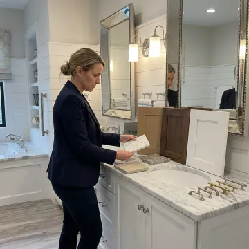 Designer reviewing bathroom vanity samples