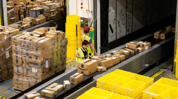 Busy shipping warehouse during peak holiday season with high parcel volume