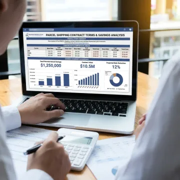 Analyst reviewing parcel carrier contract data