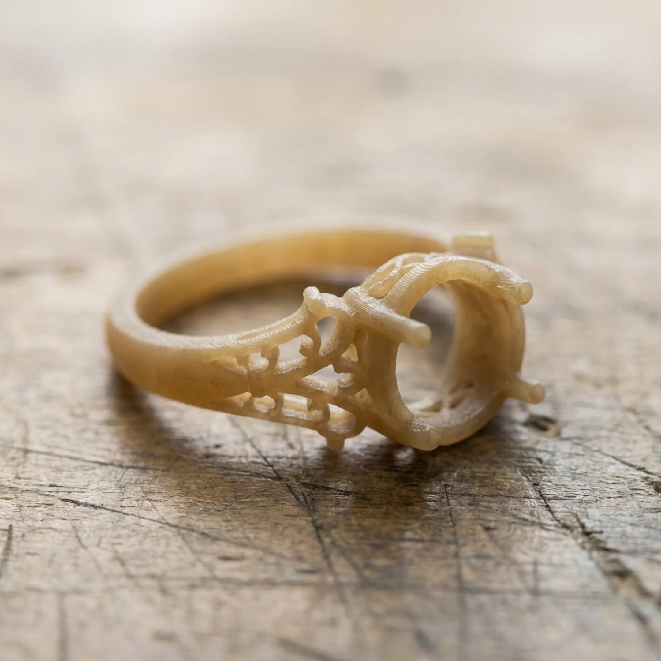 Detailed wax 3D printed ring pattern ready for investment casting