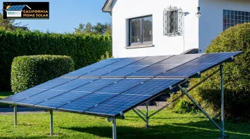 Residential ground-mount solar panel system installed in suburban backyard yard