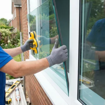 Close-up view of Low-E glass window installation showing energy-efficient features