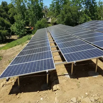 Ground mount solar installation showing optimal panel positioning and spacing