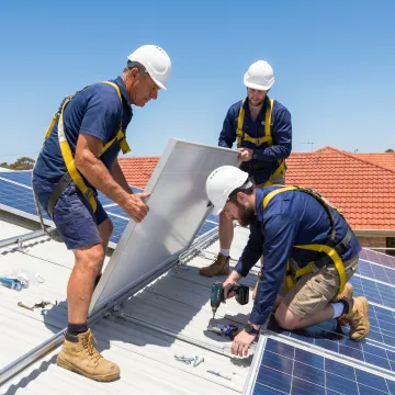 Solar installers working on a residential rooftop