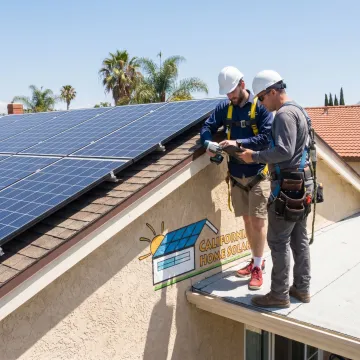 Residential solar panels installed on a sunny home