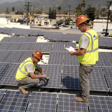 Commercial solar panels installed on a business roof
