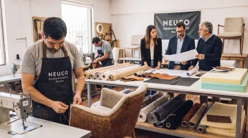 CallNeuco upholstery specialists collaborating with design team on furniture customization