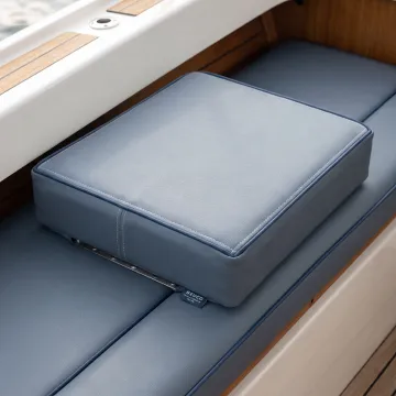 Custom cushioned boat seat booster on marine seating