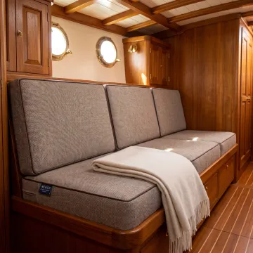 Custom upholstered cushions in a boat cabin