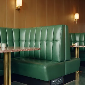 Button tufted back restaurant booth