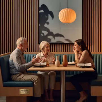 Fabric-wrapped acoustic panels in a restaurant dining room