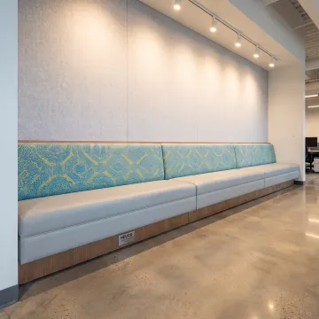 Custom upholstered bench cushion in a commercial interior