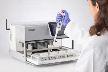 Manta automated FFPE DNA extraction platform processing cartridges in clinical laboratory setting