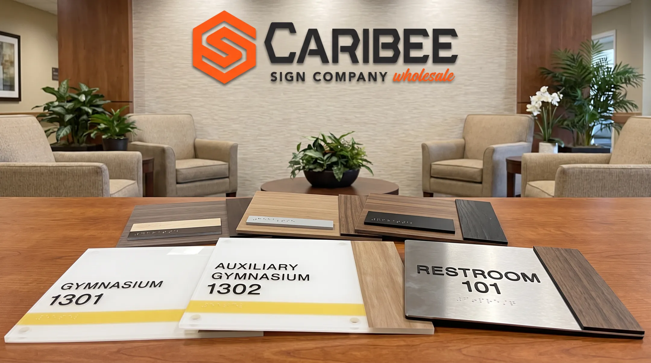 ADA compliant signage samples in acrylic metal and wood-grain finishes