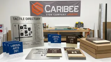 ADA-compliant braille room plaques and tactile directory signage examples
