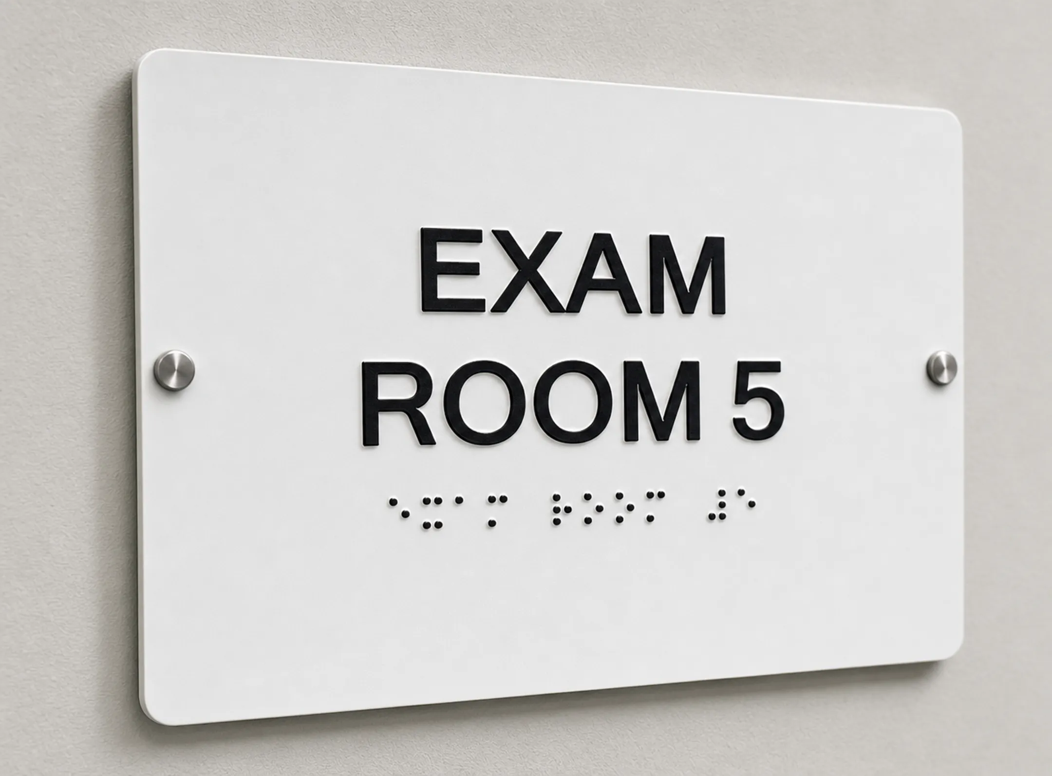 ADA-compliant hospital room sign with Braille and tactile lettering