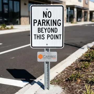 No Parking Beyond This Point sign near a commercial lot