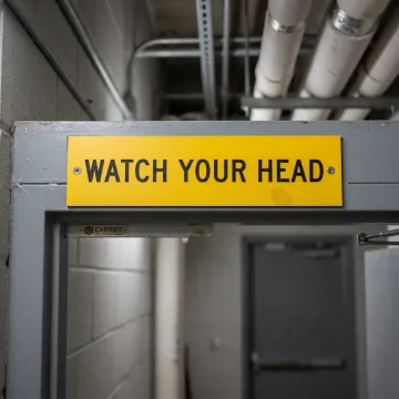 Healthcare facility low headroom warning sign