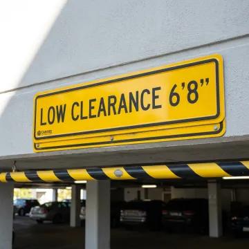 Multifamily parking garage watch your head sign