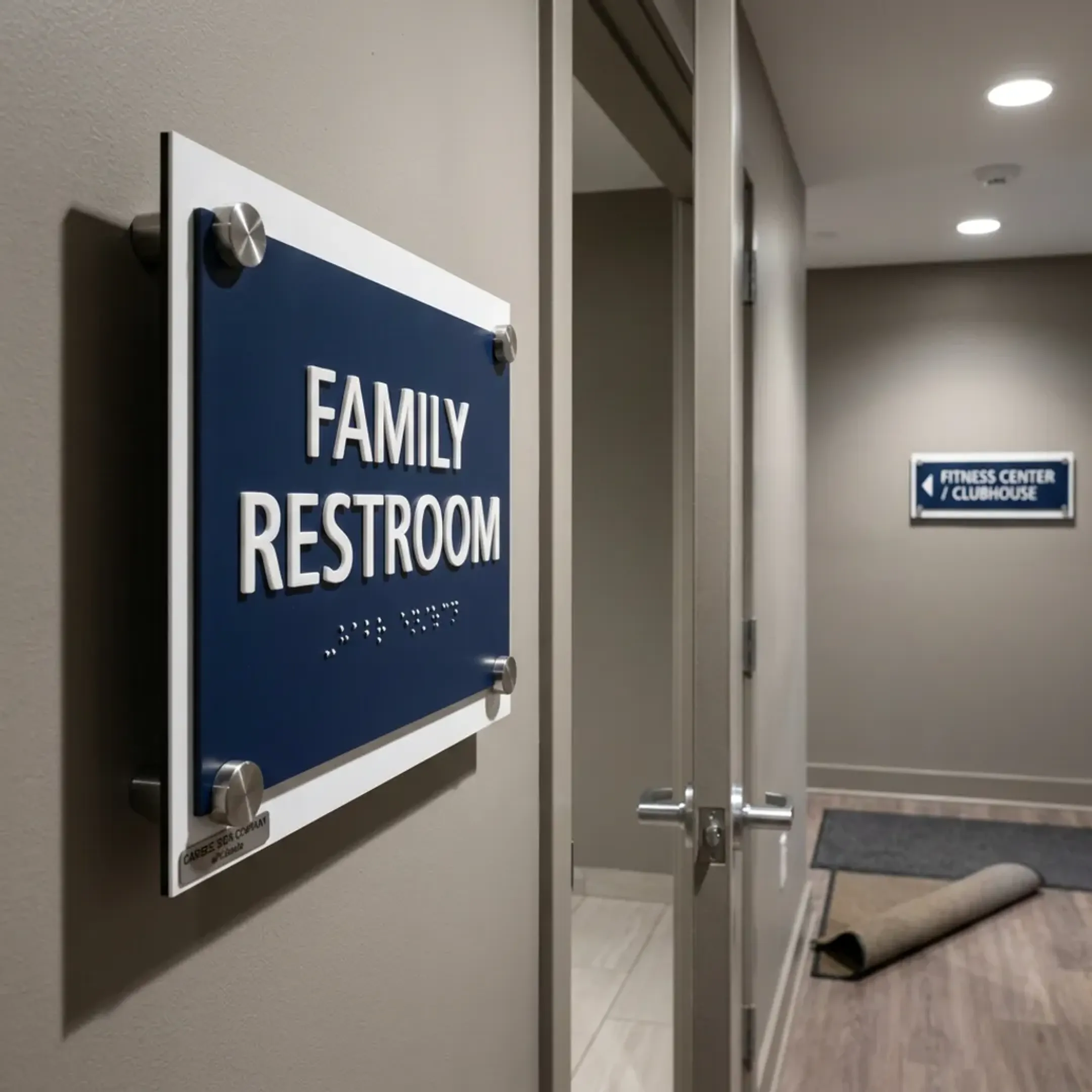 Family restroom sign in a multifamily residential property