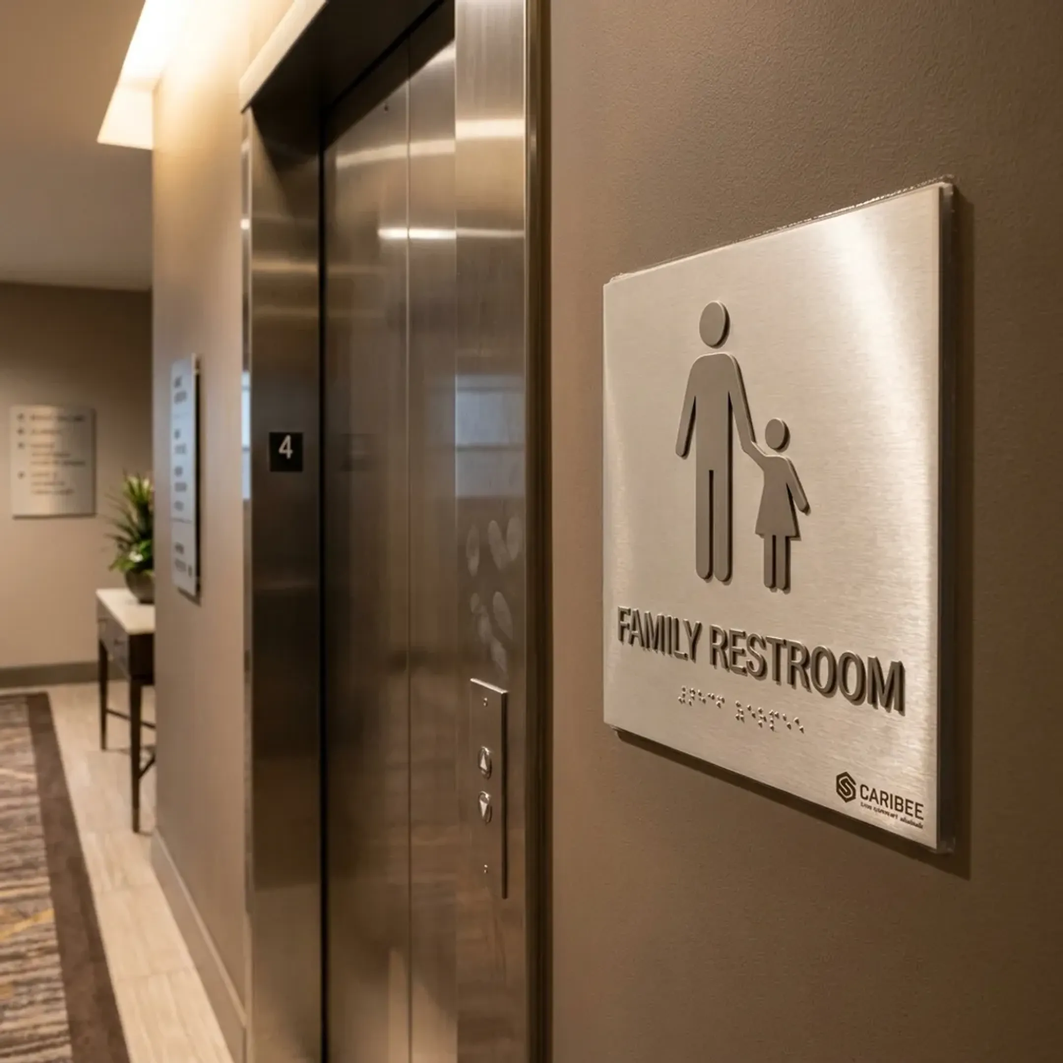 Family restroom sign in a hospitality venue