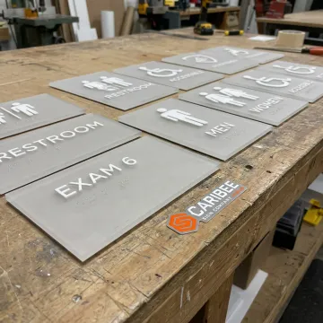 ADA Braille signs prepared for commercial installation