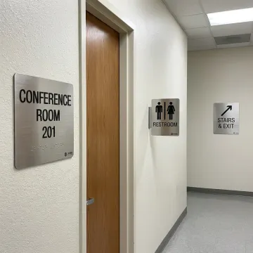 ADA signs in commercial corridor