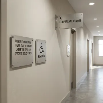 ADA-compliant signs in a commercial building