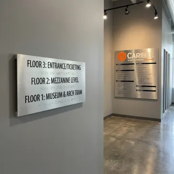 ADA and wayfinding signs in a Harrisburg commercial building