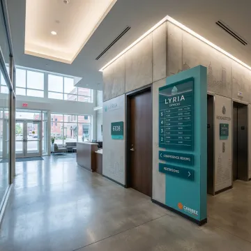 Custom ADA and wayfinding signs in Rochester building